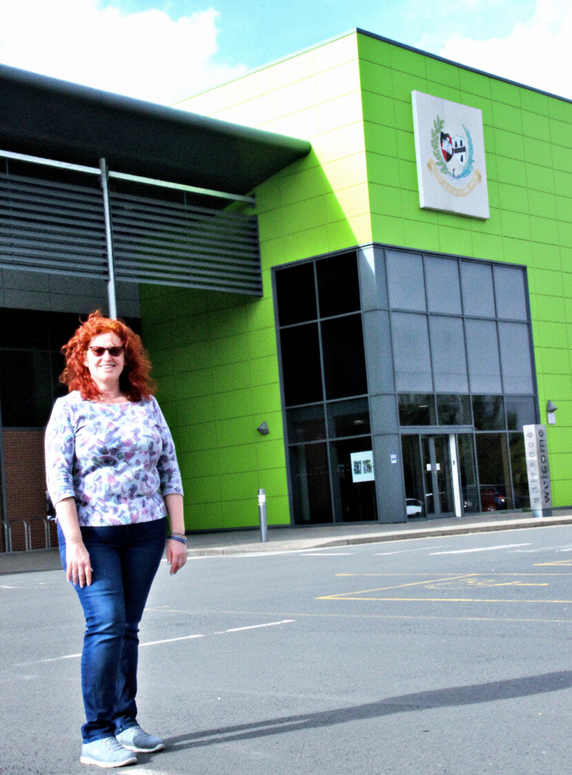 Cllr Karen Holmes outside Perdiswell Leisure Centre