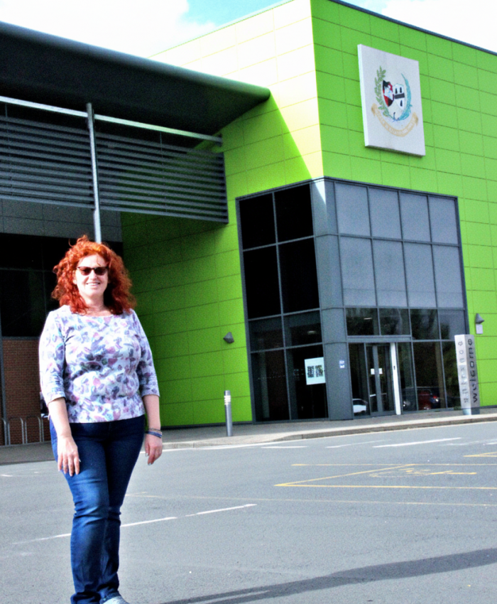 Cllr Karen Holmes outside Perdiswell Leisure Centre