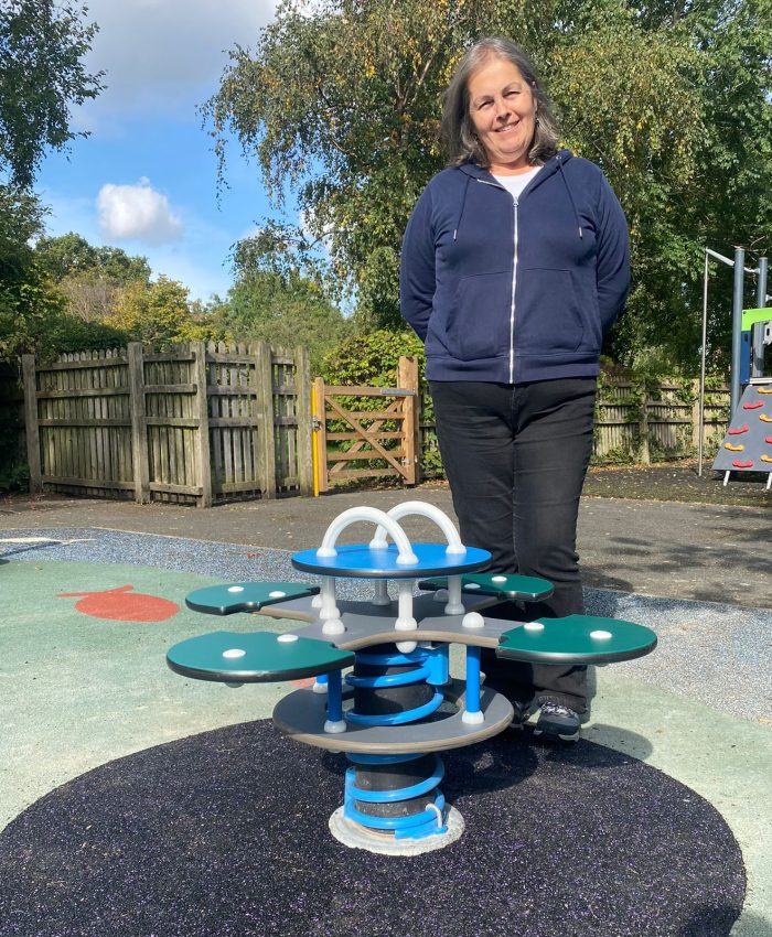 Cllr Murray and the new Four Way Rocker in Caister Avenue Play area