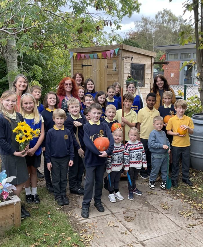 Cllr Karen Holmes meeting NMPS Children in their Wellbeing Garden and Allotment